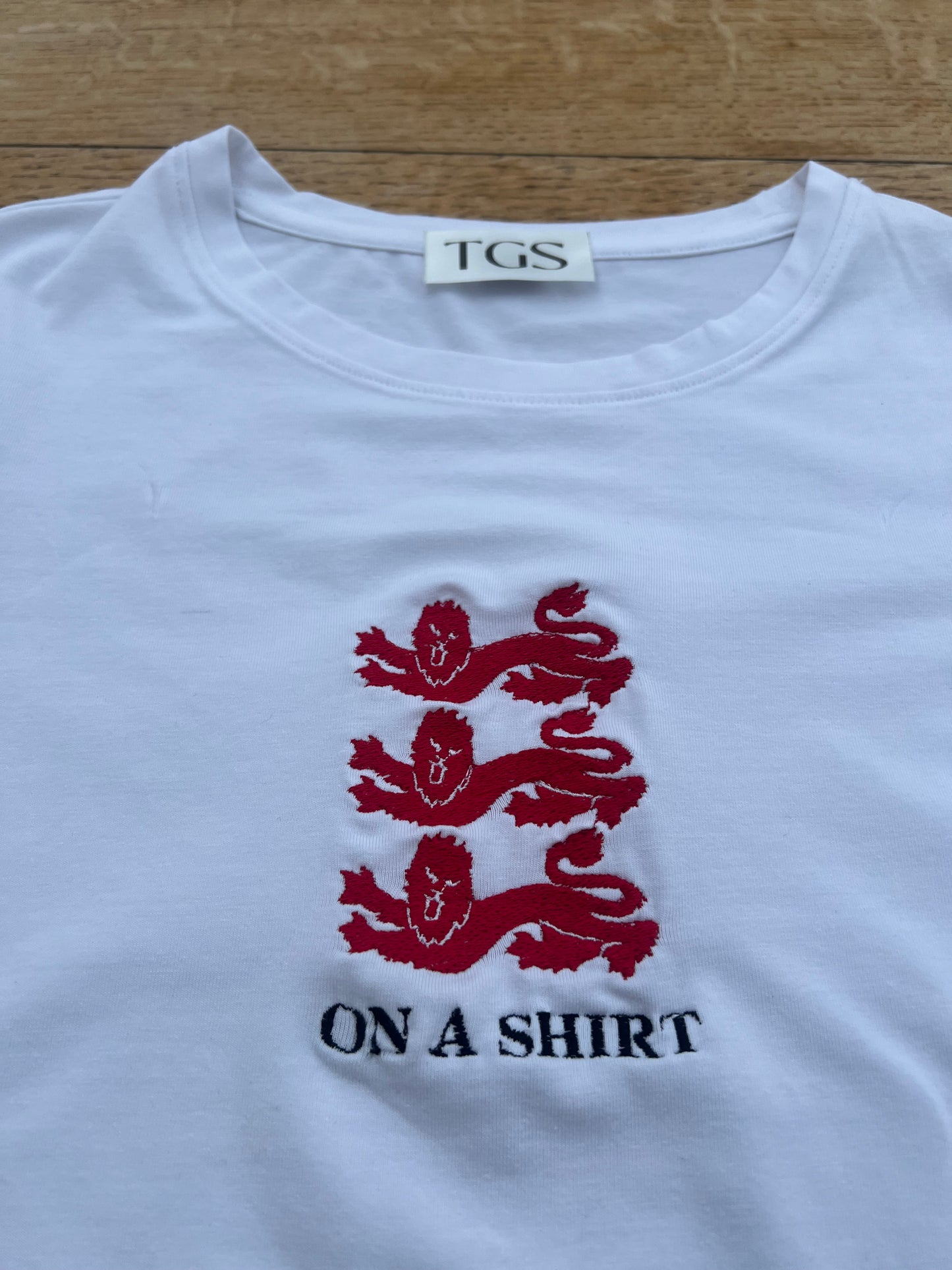 3 Lions On A Shirt Baby Tee