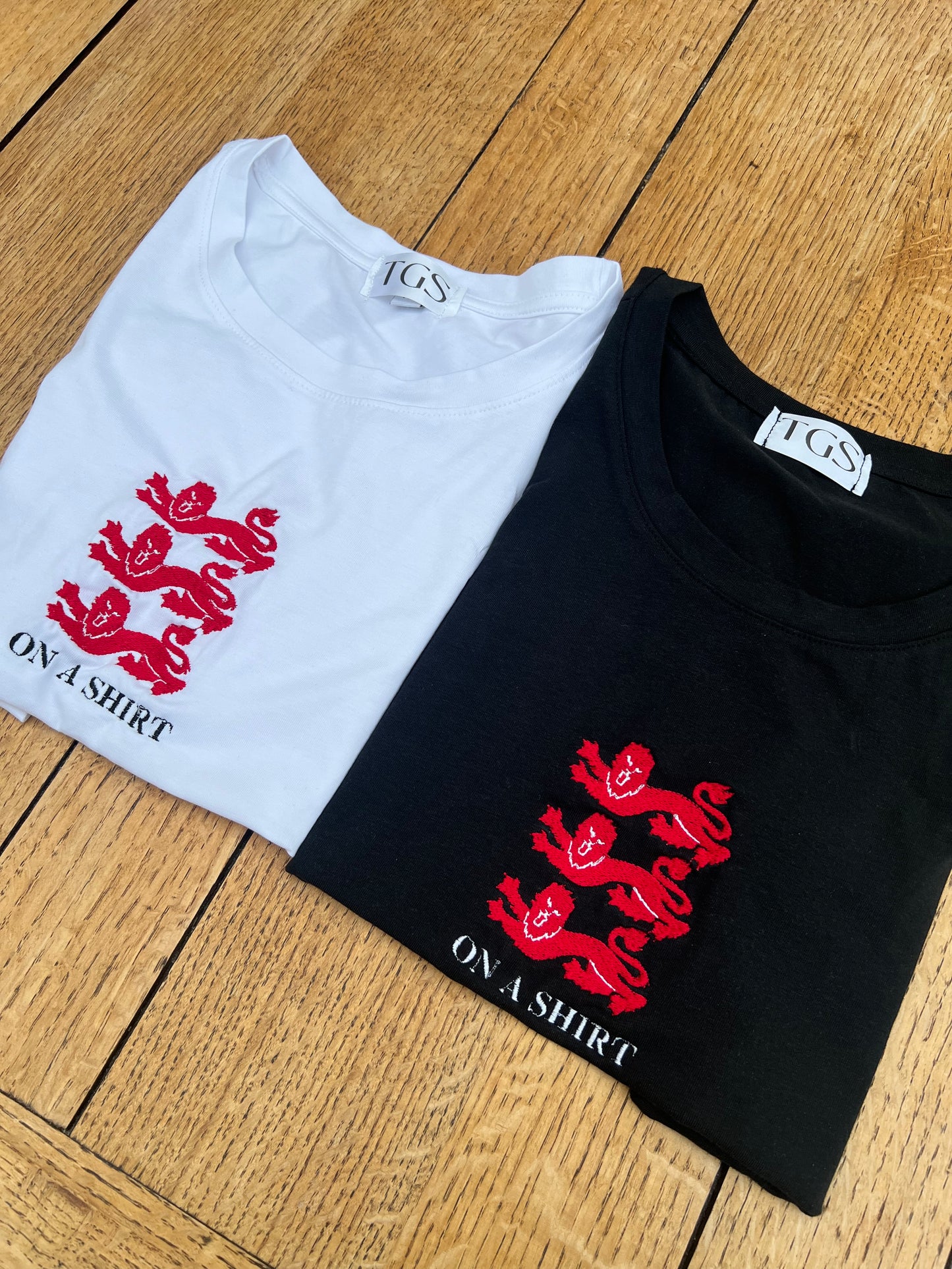 3 Lions On A Shirt Baby Tee
